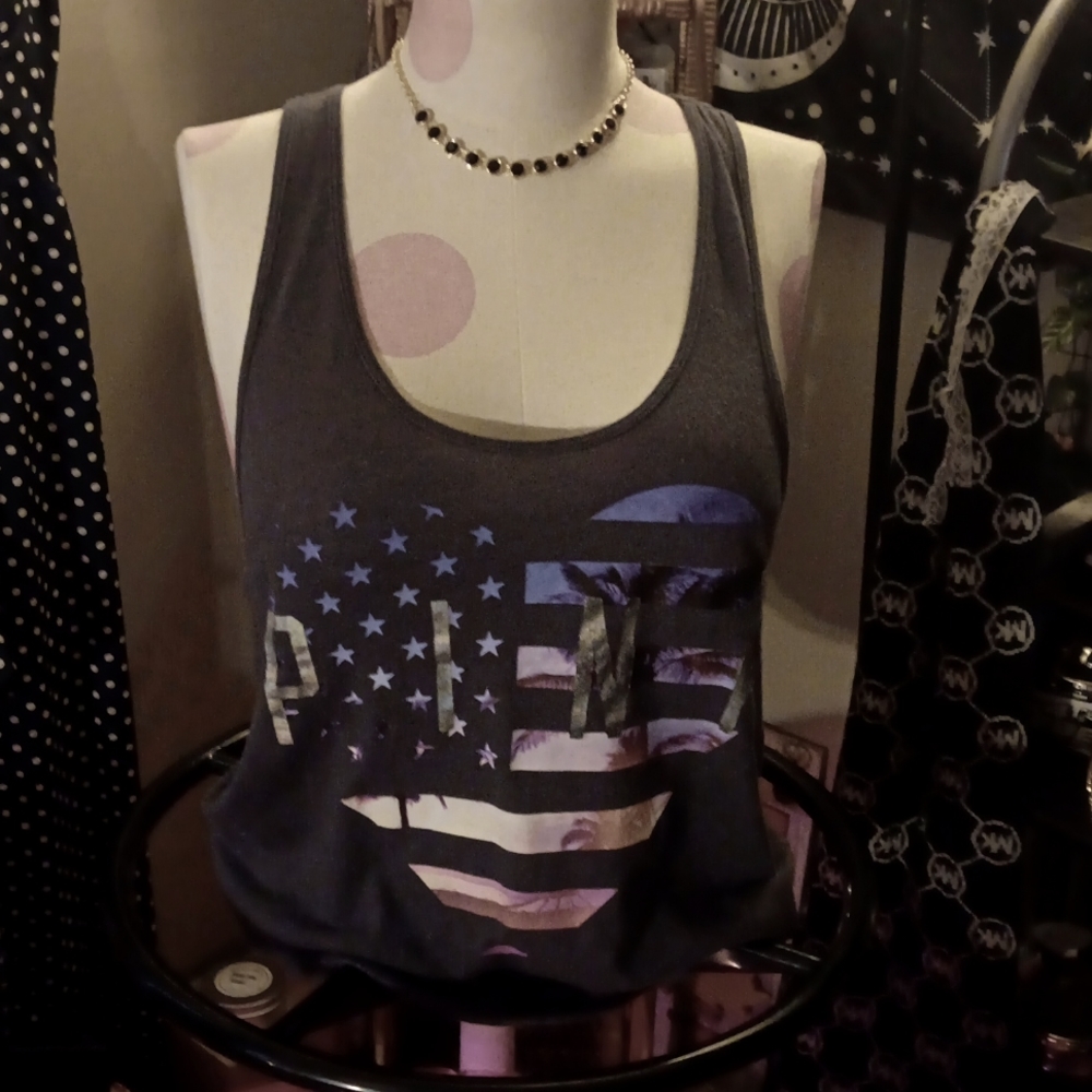 Tank - Picture 1 of 5